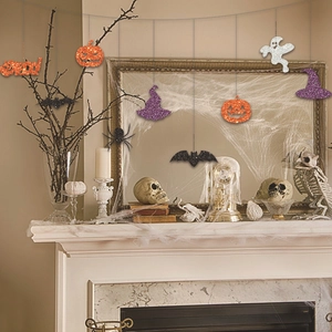 Glittery Halloween banner with pumpkin, bat and ghost hanging decorations for party decor