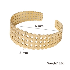 Detailed view of 60mm diameter gold textured cuff bracelet with size and weight specs