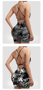 Detail of cross back straps and tie-dye fabric on slim fit yoga romper jumpsuit