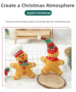 Close-up of two knitted gingerbread dolls with chef and Santa hats for Christmas decor