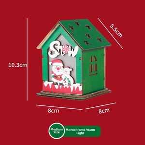 Detail showing a medium-sized DIY light-up wooden Christmas house with dimensions and Snow art