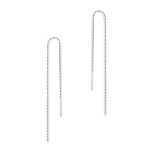 Close-up of elegant S925 sterling silver box chain drop earrings with tassels