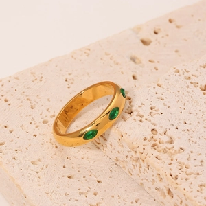 French vintage gold geometric ring featuring three marquise emerald green gemstones