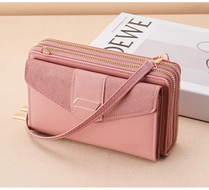 Pink multi-compartment crossbody phone wallet with triple zippers and gold metal hardware