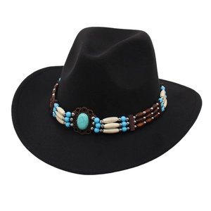 Black western cowboy hat with turquoise beads and vintage bohemian decorative band