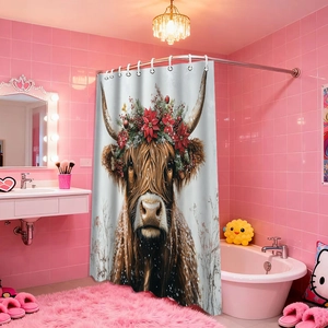 Detail of waterproof polyester shower curtain with a festive Christmas highland cow print