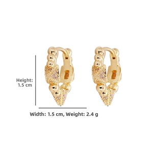 Detail of gold zircon hoop earrings measuring 1.5cm by 1.5cm with beaded texture