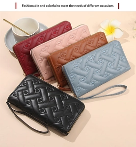 Quilted long wallets for women with heart embossed detail and zipper closure in five colors