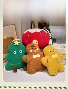 Detailed view of four Christmas plush pillows including gingerbread man and embroidered tree