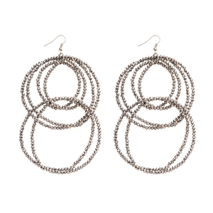 Exaggerated silver layered circle beaded drop earrings with geometric hoop design