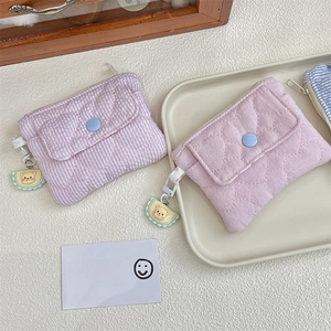 Quilted fabric mini coin purse with heart stitching and cute bear charm detail