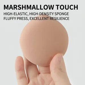 Peach-shaped high-density sponge makeup puff with soft marshmallow texture for foundation