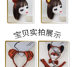 Detailed four-piece plush tiger costume set with striped ears, mask, bowtie, and tail
