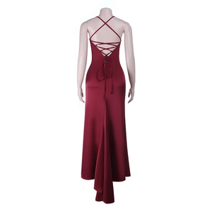 Detail of burgundy satin evening dress featuring a deep open back and crisscross ties