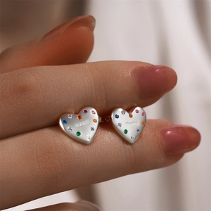 Detailed close-up of 925 sterling silver mama heart stud earring with colorful zircons
