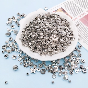 Mixed antique silver alloy spacer beads in heart, butterfly, and shell shapes for DIY jewelry