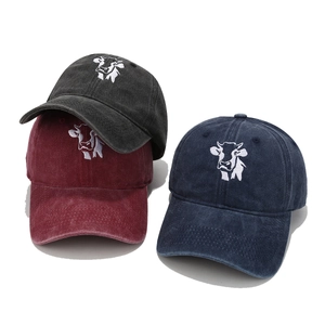 Washed cotton baseball caps with cow embroidery in dark grey, burgundy and navy colors