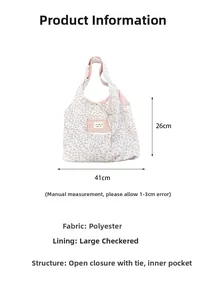 Detail view of large floral canvas tote bag showing pink floral pattern and size dimensions