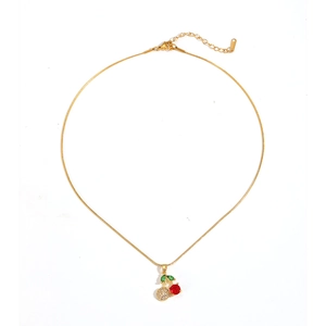 Elegant gold cherry pendant necklace with red crystal and green leaf on white background