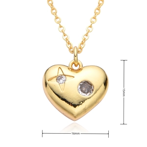 Detailed view of heart-shaped gold necklace with sparkling rhinestones and size labels