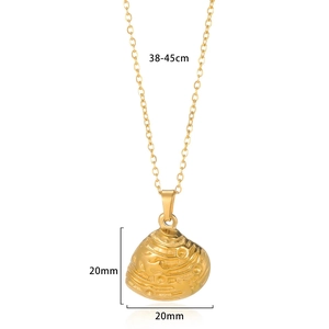 Detail of gold shell necklace showing 20mm round pendant with 38-45cm chain dimensions