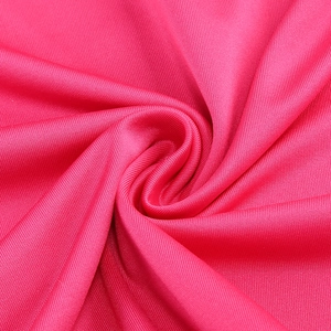 Detailed macro view of the rose red lace dress with premium fine knit fabric texture