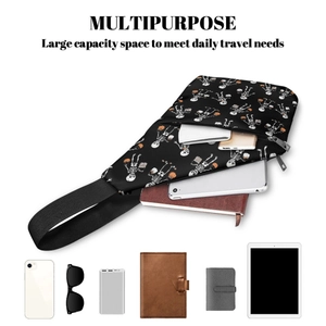 Detailed interior view of a Halloween pumpkin sling bag showing large storage capacity