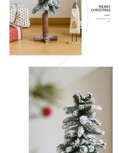 Close-up of mini snow-flocked Christmas tree with natural wood base for desktop decor