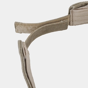 Detailed close-up of adjustable velcro strap and nylon stitching on sun visor hat