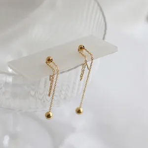 Elegant gold-tone long fringe tassel earrings with minimalist metal beads and chains