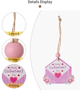 Detail display of pink wooden Valentine's Day envelope pendant with beads and lanyard