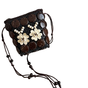Handmade Bohemian coconut shell mini crossbody bag with floral accents and wooden beads
