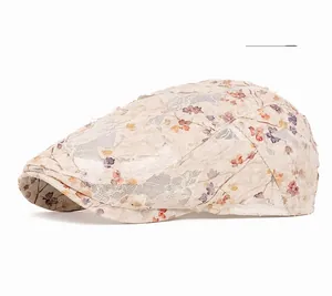 Macro detail of floral lace texture and intricate mesh on a beige summer beret hat