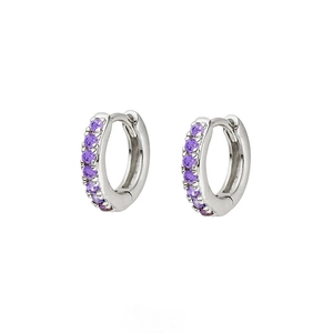 Detailed close-up of S925 sterling silver huggie earrings set with seven purple zircons