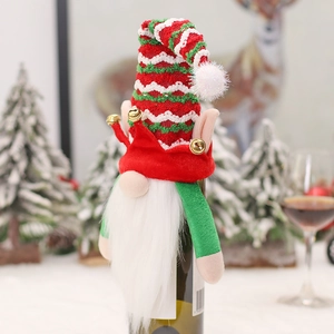 Charming Christmas gnome wine bottle covers in festive red and green colors with small bells