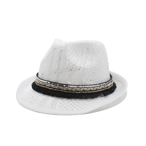 White hollow-out knit jazz fedora hat with bohemian tassel band for summer fashion