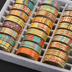 Colorful enamel titanium steel bangles with 18K gold plating in geometric floral patterns