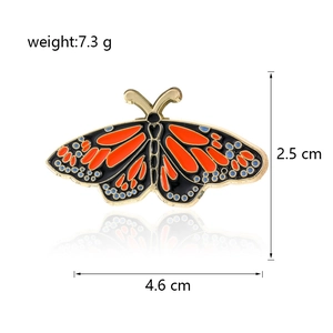 Detailed size specifications of the butterfly enamel brooch with dimensions 4.6cm by 2.5cm