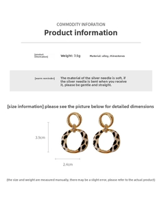 Detail view of leopard print hoop earrings with dimensions 3.9cm by 2.4cm and weight 7.5g