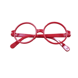 Detail of red circular plastic eyeglass frames for costume party and cosplay props