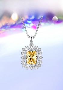 Detail of S925 silver necklace featuring a large radiant-cut yellow gemstone pendant