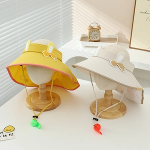 Detail of kids sun hats with cute rabbit ears and whistles on windproof cords