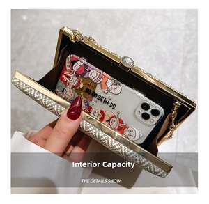Detailed interior view of acrylic clutch showing capacity for a large smartphone