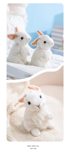 Detailed view of plush white bunny toy with soft long fur and cute standing pose