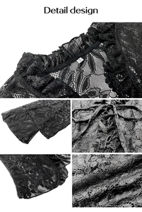 Detail design of black floral lace top showing ruffle neckline and front ribbon tie