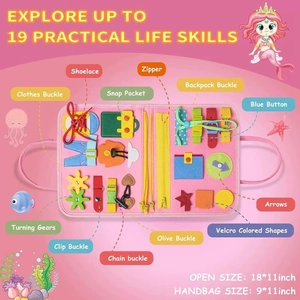 Pink marine themed busy board for toddlers featuring 19 life skill training modules