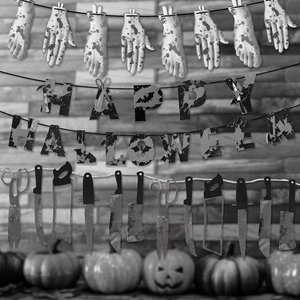 Three-piece Halloween banner set with bloody weapons, limbs, and Happy Halloween letters