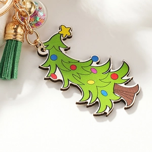 Christmas tree wooden keychain with colorful stars, green tassel and gold metal ring
