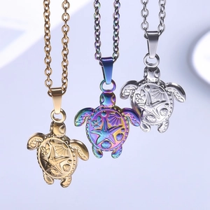 Marine sea turtle pendants in gold, silver and rainbow finishes with starfish engraving