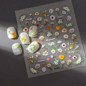3D embossed daisy nail art stickers with Co-308 floral patterns on dark grey background